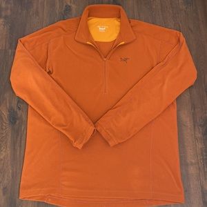 Arc’teryx long sleeve neck zip shirt size X-LARGE.